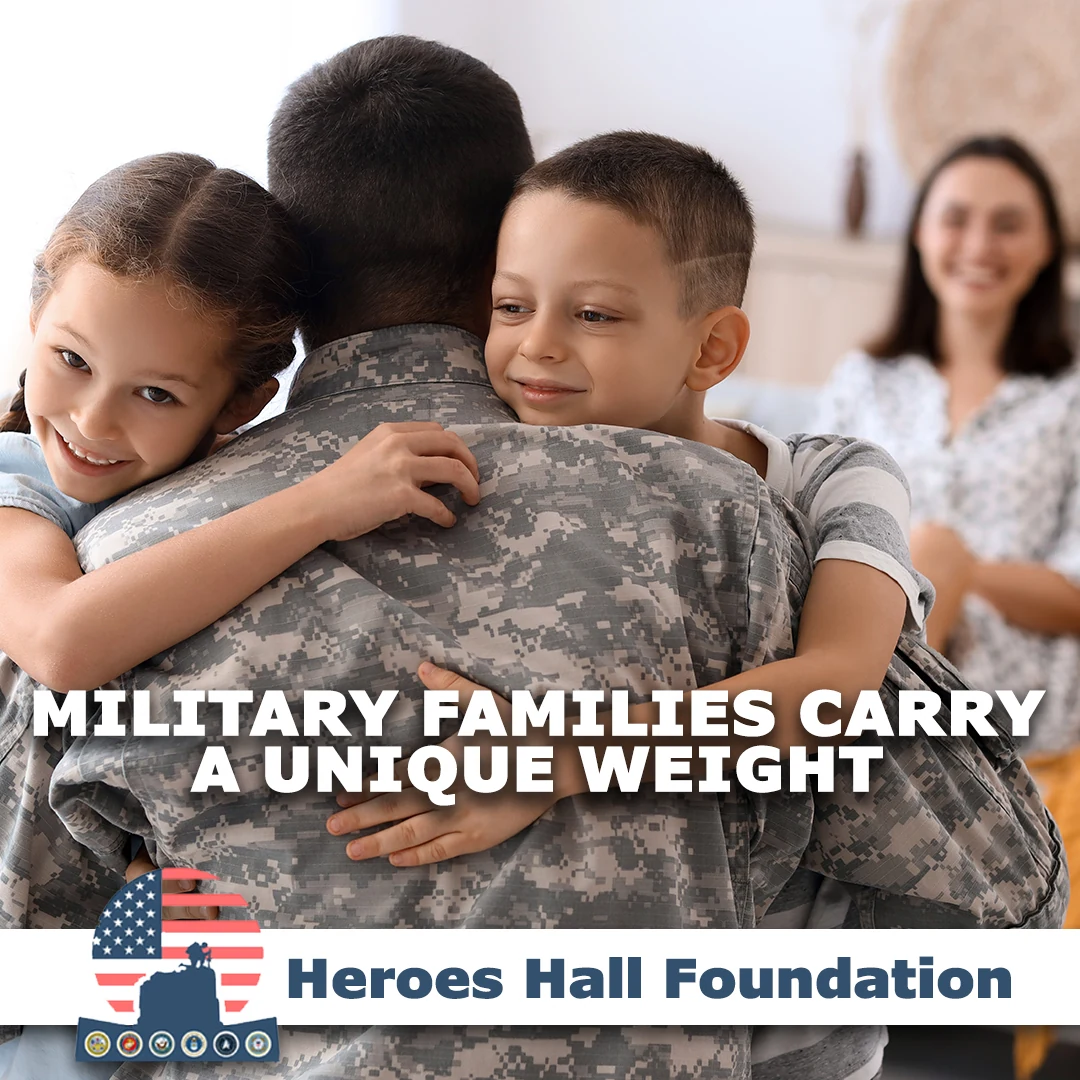Children embracing a returning service member, with another family member nearby